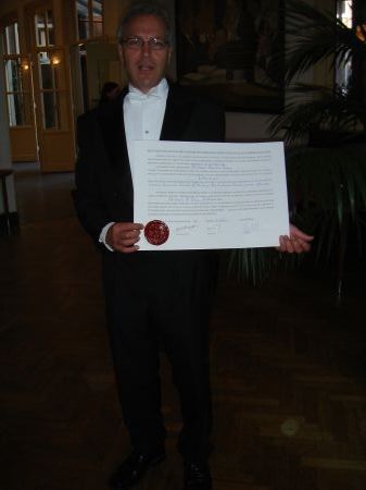 Michael Day with his doctoral diploma at Leiden University.